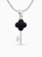 Close up SIJA 925 silver jewellery black pink glimmer key pendant handcrafted premium design versatile accessory for everyday wear and special occasions