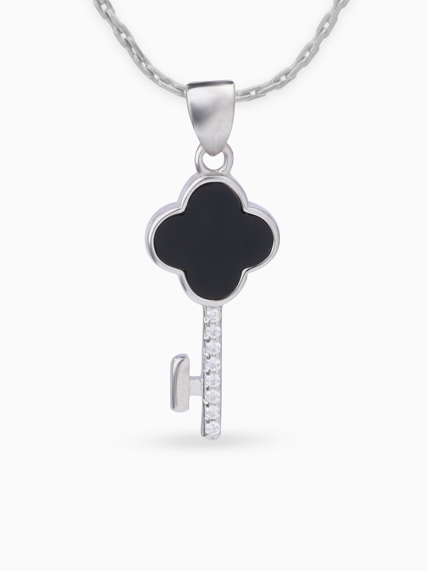 Close up SIJA 925 silver jewellery black white glimmer key pendant handcrafted premium design versatile accessory for everyday wear and special occasions
