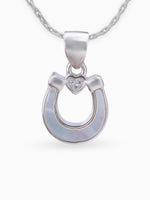 Close up SIJA 925 silver jewellery black white lucky heart pendant handcrafted premium design versatile accessory for everyday wear and special occasions