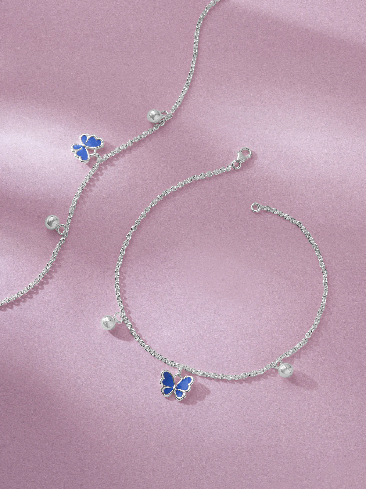 Detailed close up of SIJA 925 Silver Blue Butterfly Jingle Anklet highlighting blue butterfly charm craftsmanship