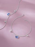 Detailed close up of SIJA 925 Silver Blue Butterfly Jingle Anklet highlighting blue butterfly charm craftsmanship