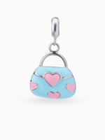 Close up SIJA 925 silver jewellery blue pink heart bag charm handcrafted premium design versatile accessory for everyday wear and special occasions