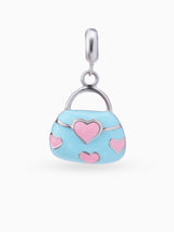 Close up SIJA 925 silver jewellery blue pink heart bag charm handcrafted premium design versatile accessory for everyday wear and special occasions