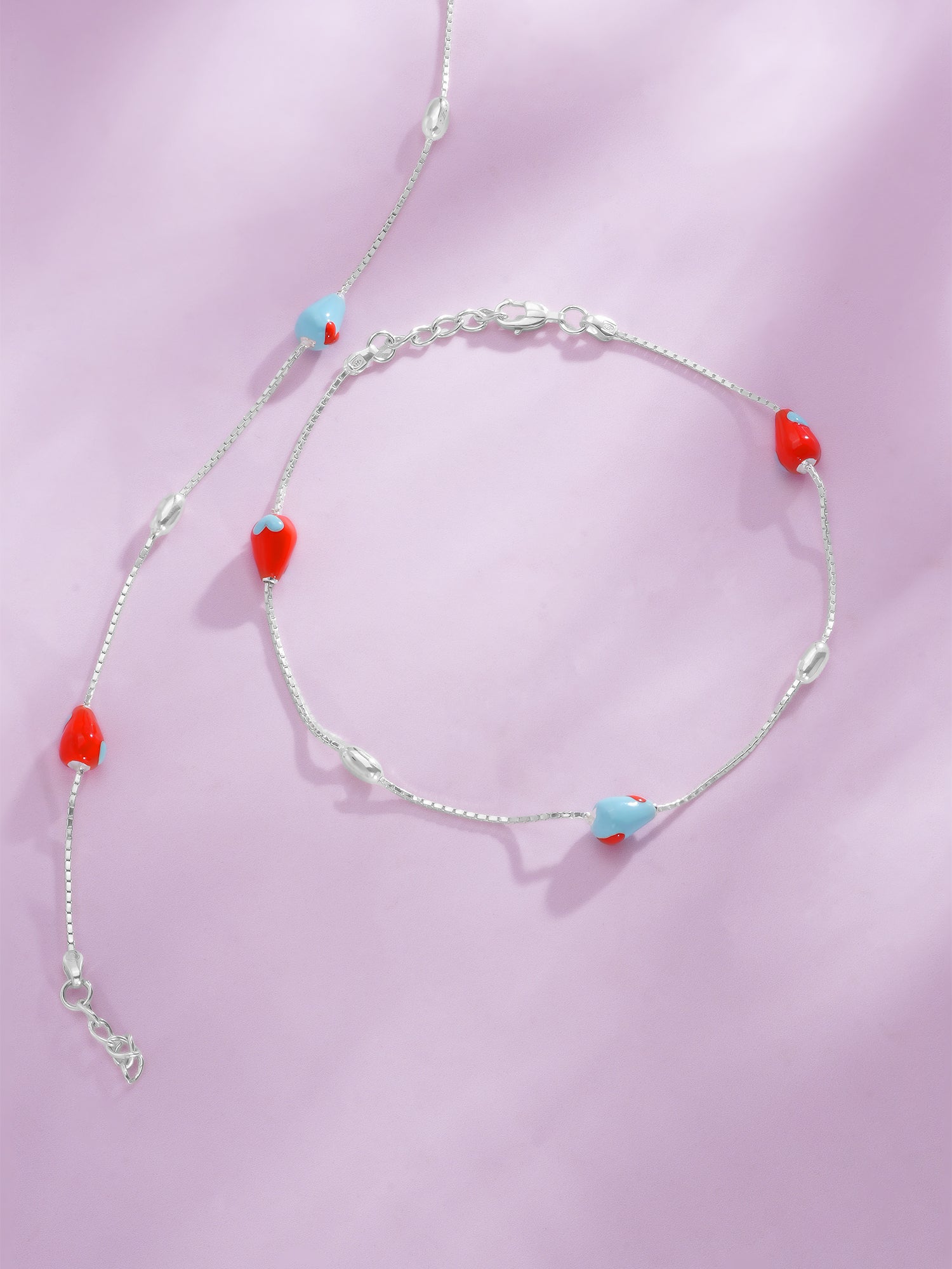 Detailed close up of SIJA 925 Silver Blue and Red Beads Glow Anklet showing glowing blue and red beads with handcrafted silver finish