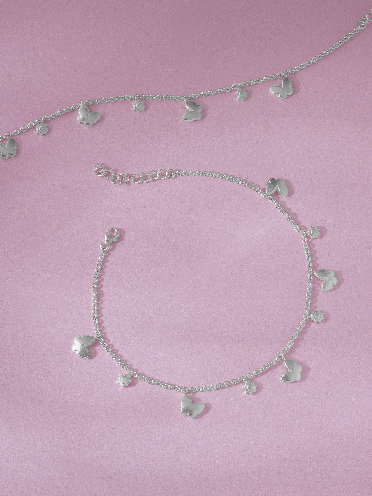 Detailed close up of SIJA 925 Silver Butterfly Bud Anklet highlighting butterfly bud charm craftsmanship