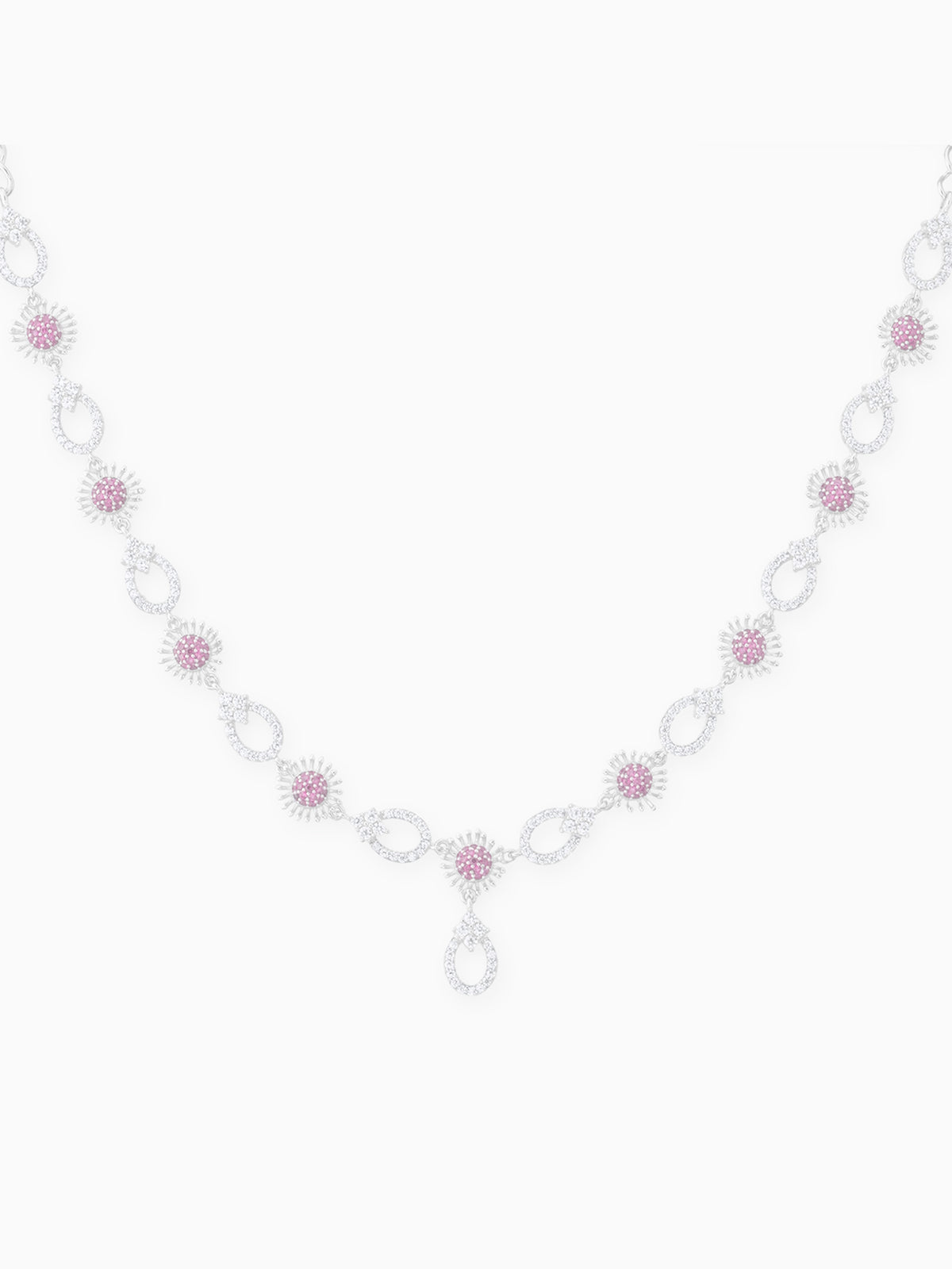 Detailed close up of SIJA Crimson Bloom Necklace & Earrings showing sparkling crimson stones with delicate floral craftsmanship