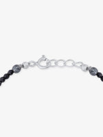 Side profile of SIJA 925 Silver Evil Eye & Black Beaded Kids Bracelet sterling silver jewellery elegant accessory durable construction polished edges