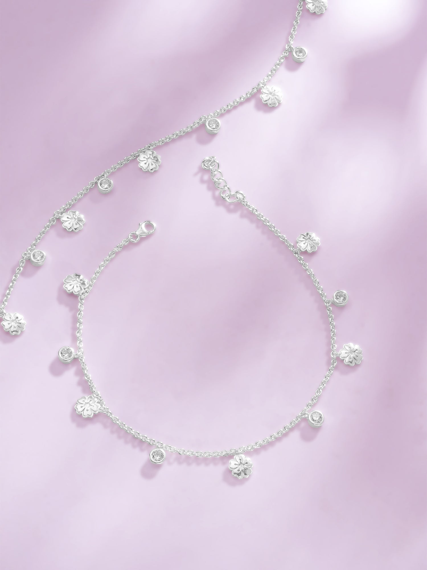 Detailed close up of SIJA 925 Silver Floral Bloom Anklet showing delicate flower charms and handcrafted silver finish