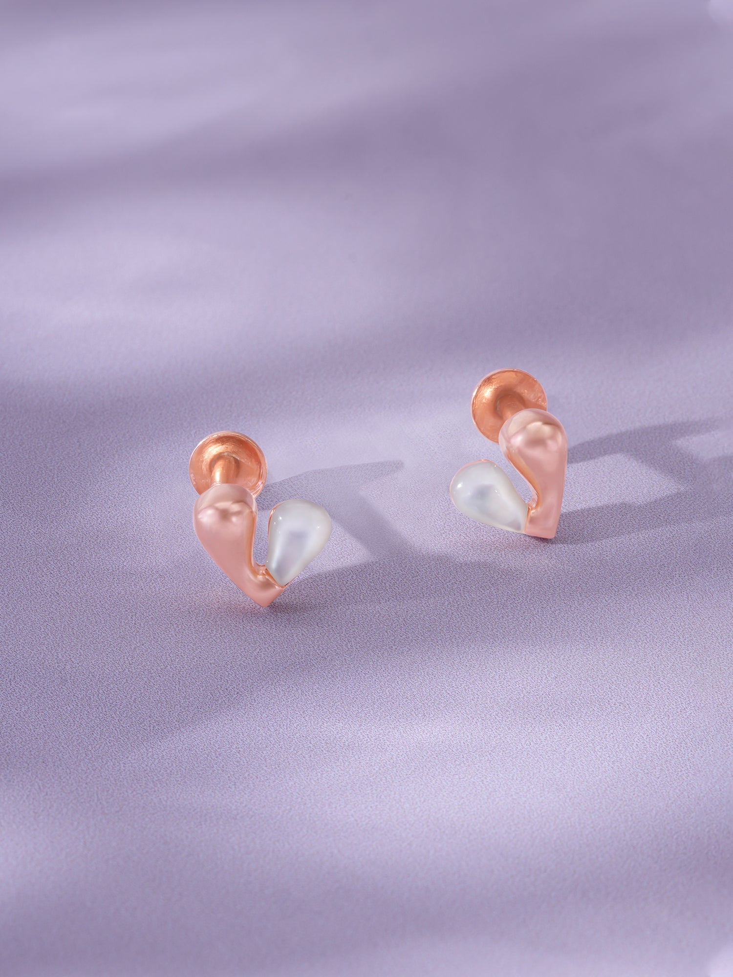 Detailed close up of SIJA 925 Silver Glow Pearl Heart Stud showing luminous pearl set in delicate heart motif