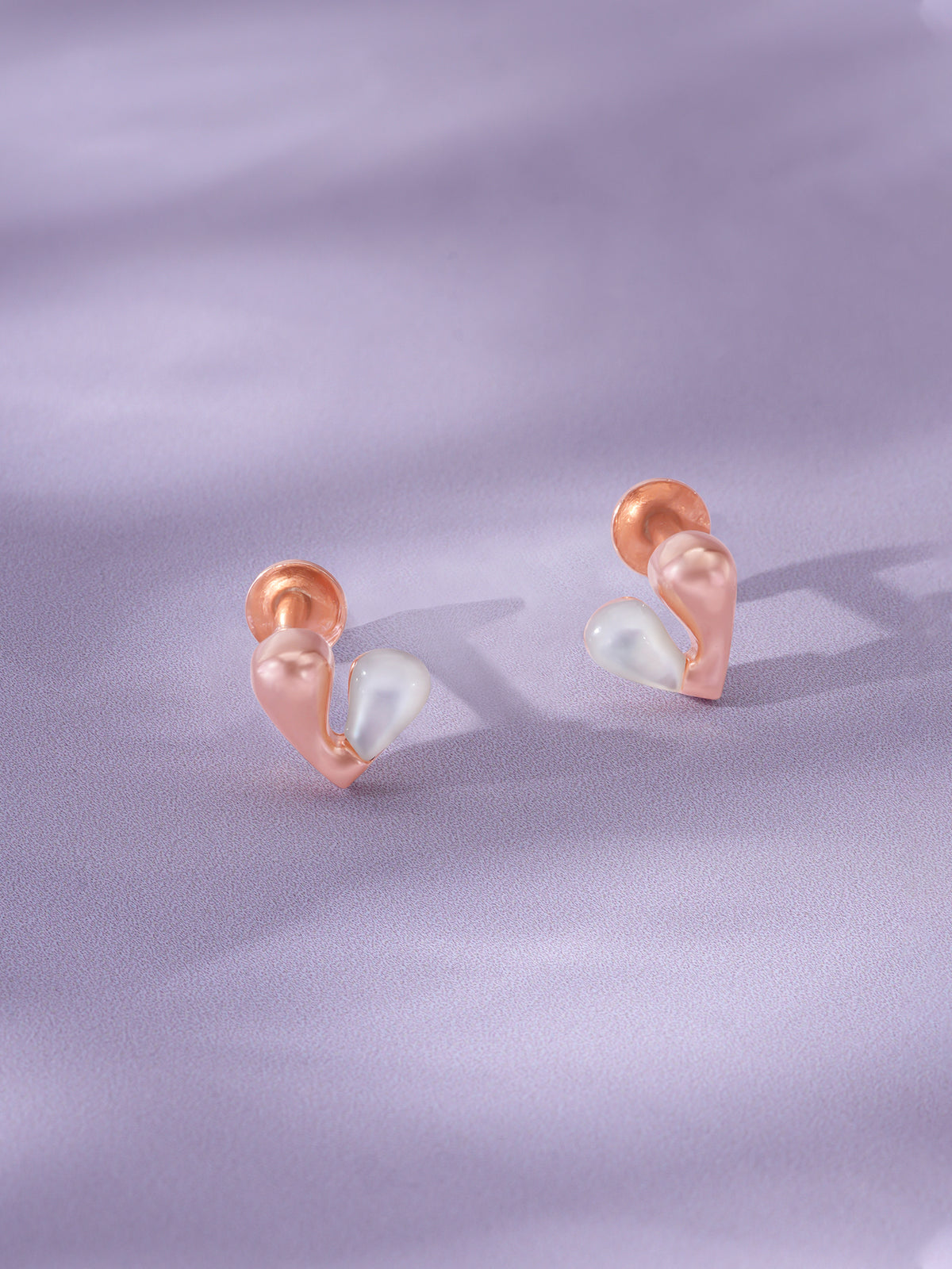 Detailed close up of SIJA 925 Silver Glow Pearl Heart Stud showing luminous pearl set in delicate heart motif