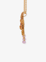 Macro view of Goddess Lakshmi Devi seated inside palanquin on SIJA 925 gold-plated antique silver pendant ornate deity figure in traditional South Indian religious jewellery