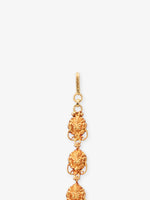 Detailed view of floral motif on SIJA 925 silver gold plated Lakshmi Tikka highlighting ornamental craftsmanship and devotional temple jewellery style