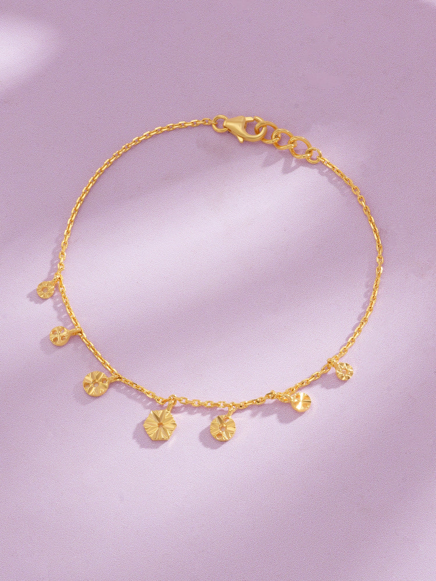 Close up of SIJA Golden Droplet Charming Bracelet showing polished droplet bead detail in sterling silver gold plated finish