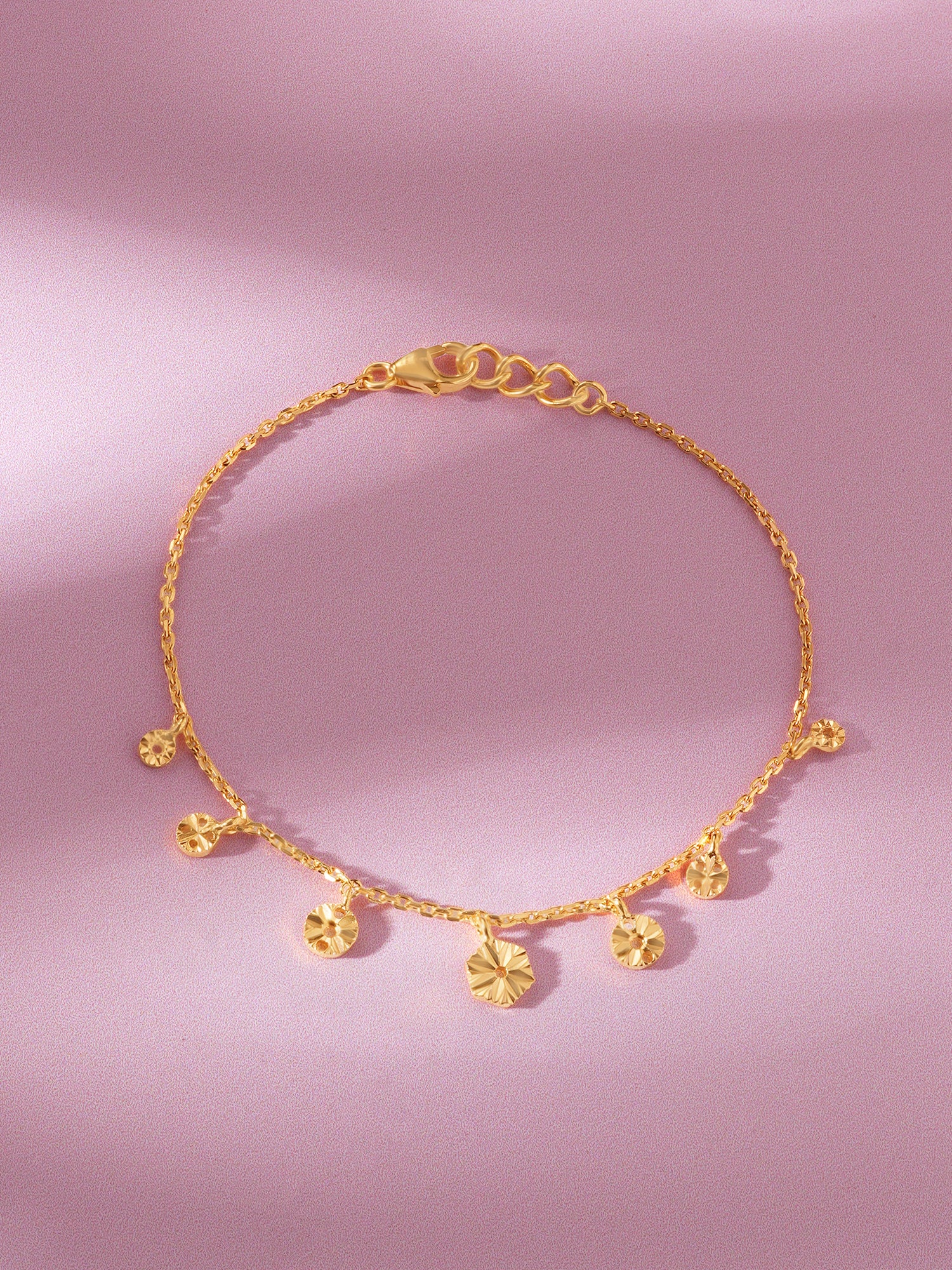 Close up of SIJA Golden Droplet Charming Bracelet showing polished droplet bead detail in sterling silver gold plated finish