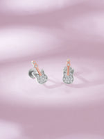 Detailed close up of SIJA 925 Silver Guitar Stud showing miniature guitar design and handcrafted silver finish