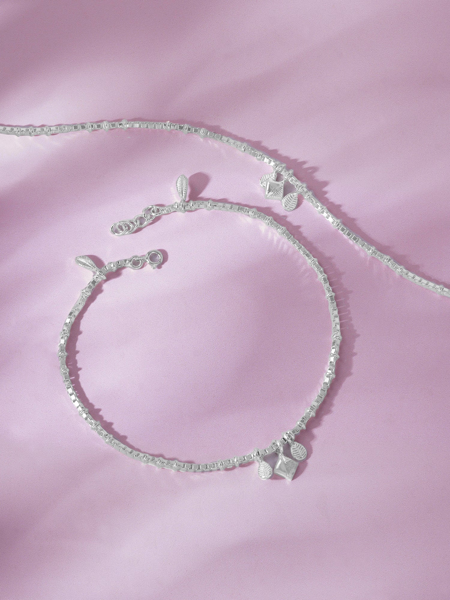 Detailed close up of SIJA 925 Silver Harmony Charm Anklet highlighting delicate harmony charm craftsmanship