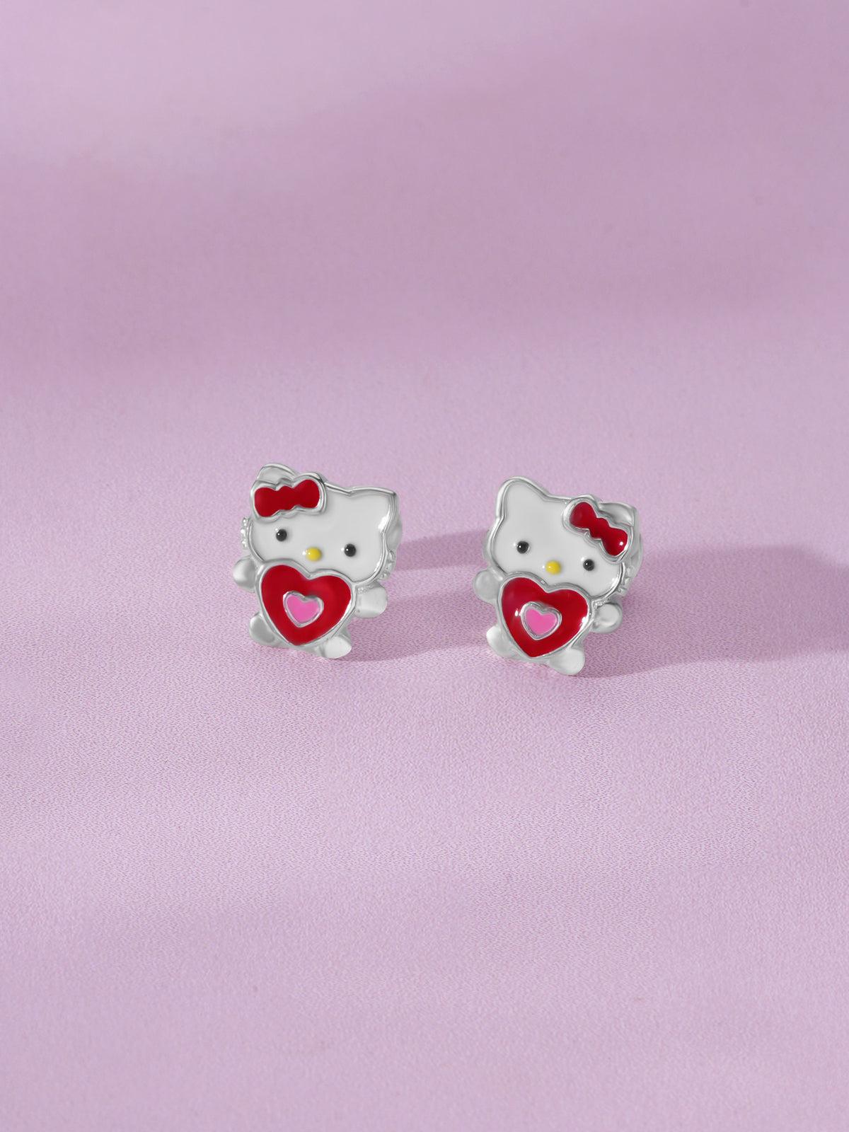 Close‑up of SIJA 925 Silver Hello Kitty Heart Stud showing iconic Hello Kitty face with heart motif handcrafted sterling silver jewellery fun accessory for children
