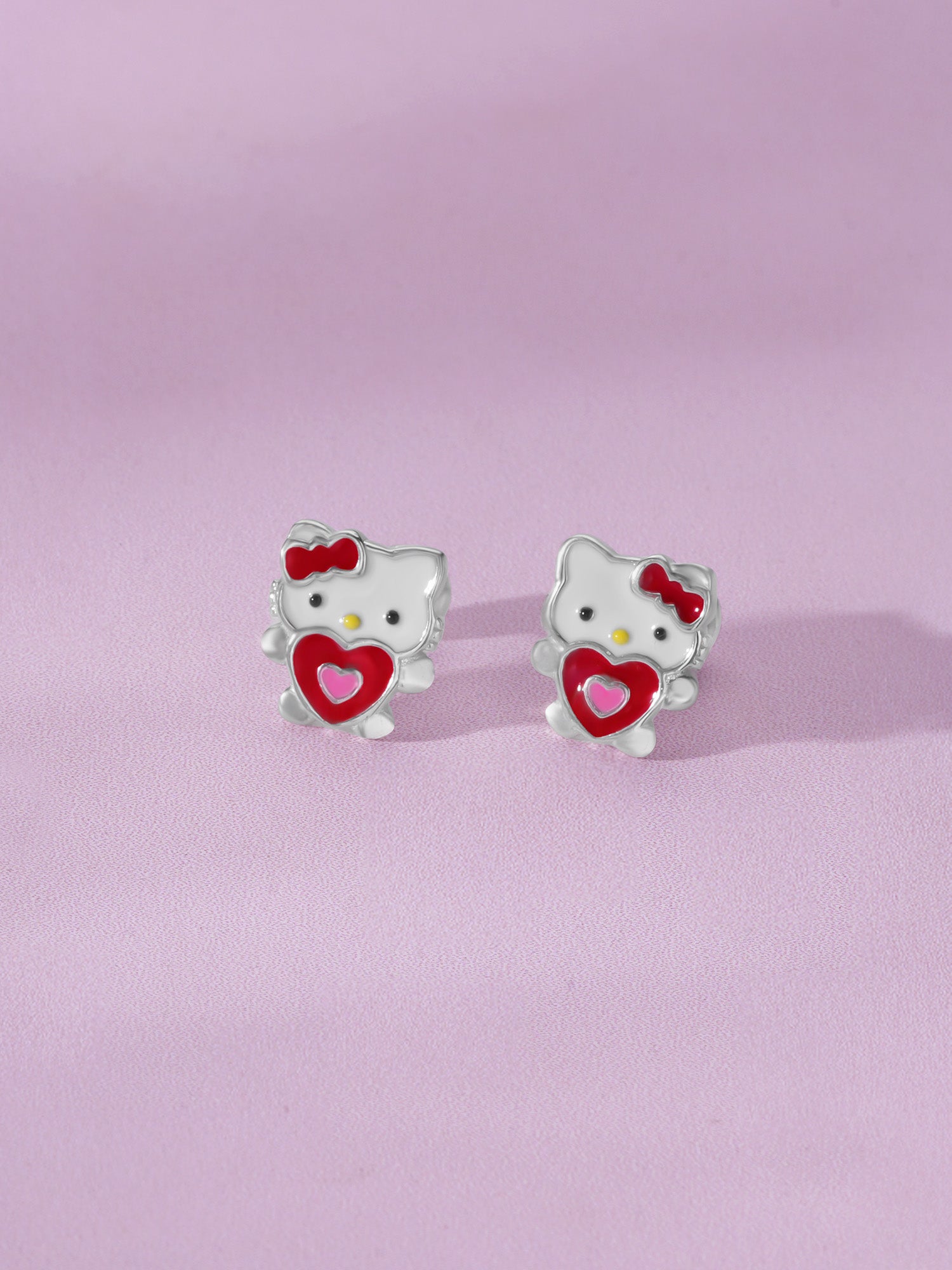 Close‑up of SIJA 925 Silver Hello Kitty Heart Stud showing iconic Hello Kitty face with heart motif handcrafted sterling silver jewellery fun accessory for children