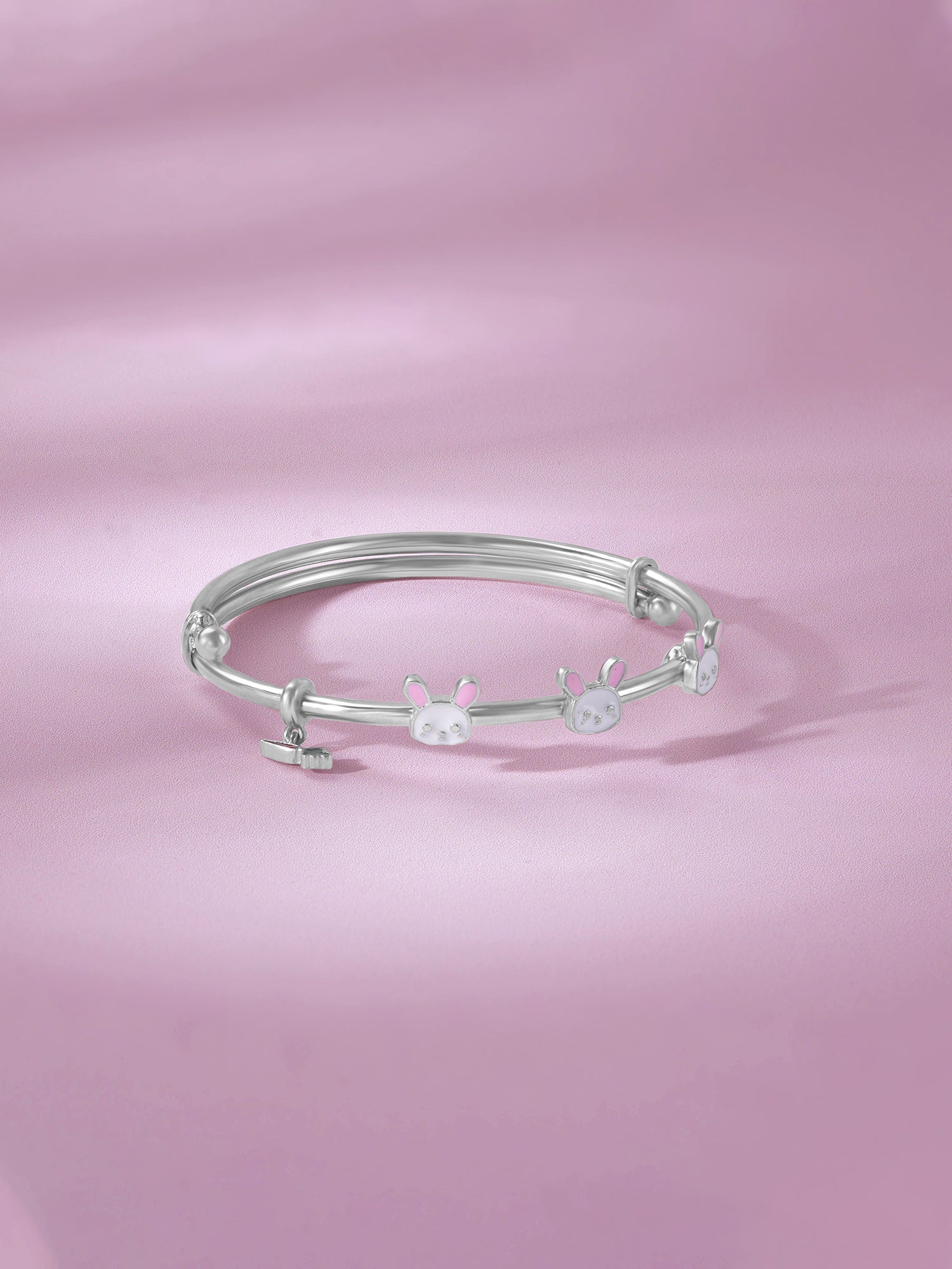 Detailed close up of SIJA 925 Silver Kids Bracelet showing cute Bunny Face Charm with enamel detailing and handcrafted silver finish