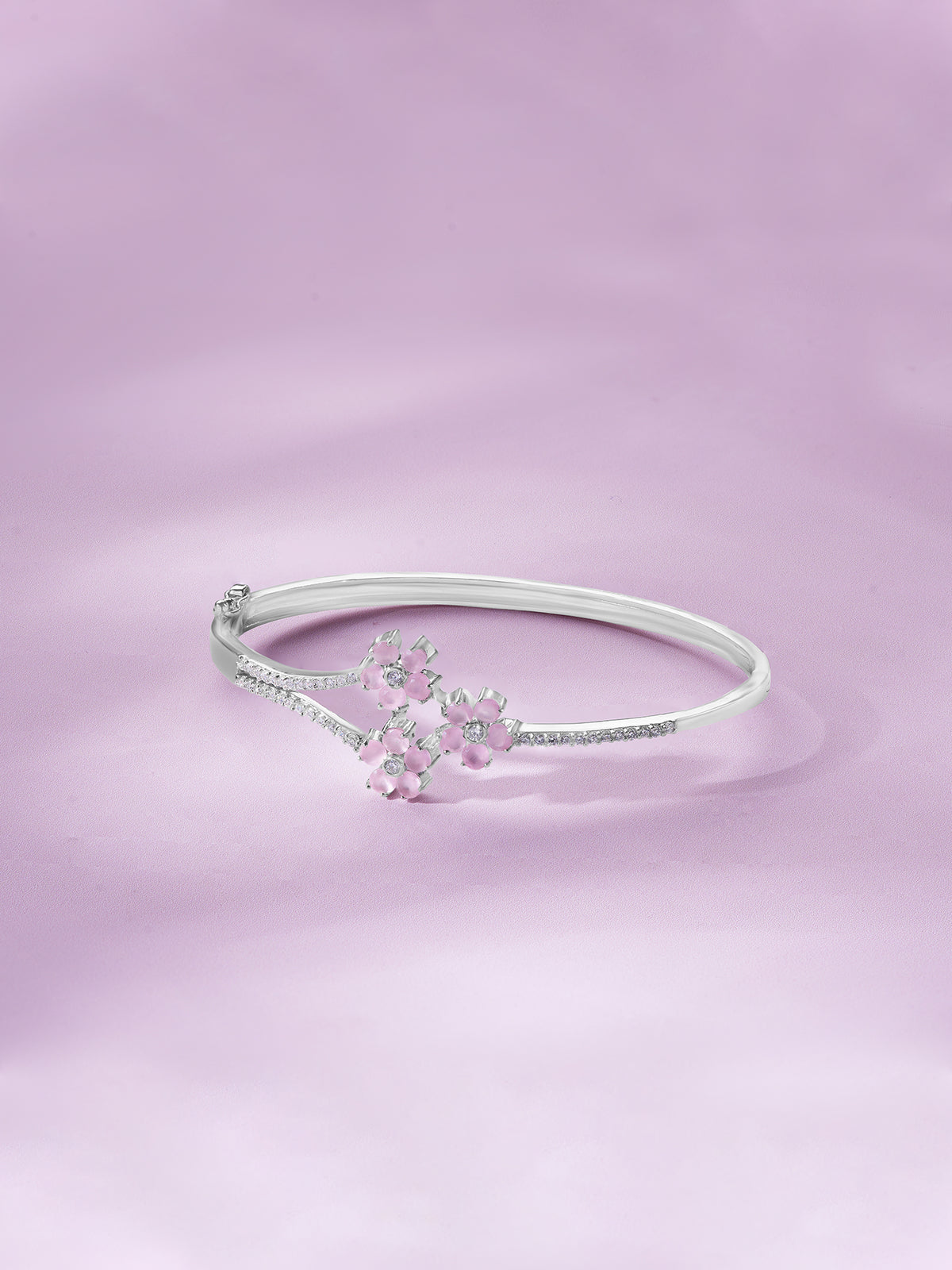 Detailed close up of SIJA 925 Silver Pink Blossom Cuff Bracelet showing delicate pink blossom floral charm and handcrafted silver finish