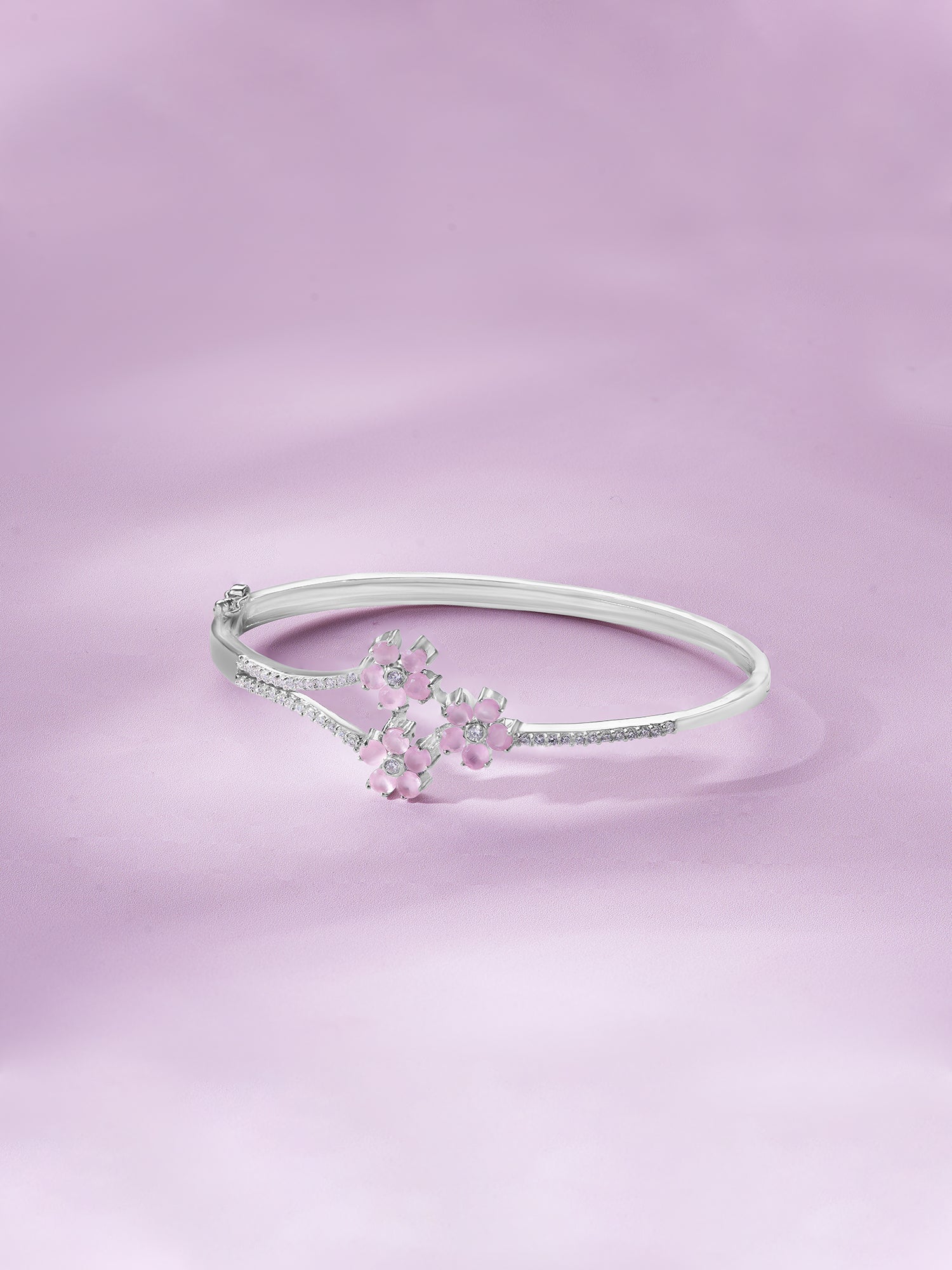 Detailed close up of SIJA 925 Silver Pink Blossom Cuff Bracelet showing delicate pink blossom floral charm and handcrafted silver finish
