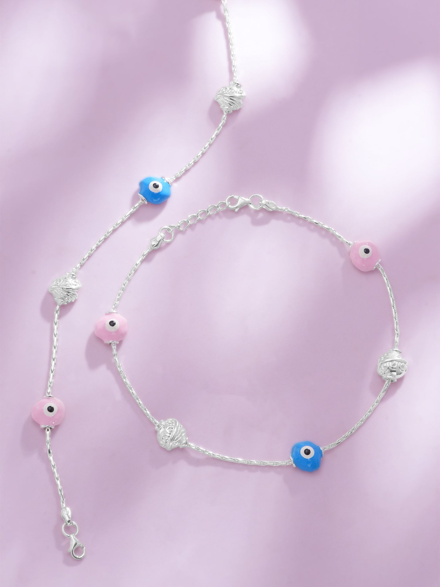 Detailed close up of SIJA 925 Silver Pink and Blue Glow Anklet showing glowing charms in pink and blue accents