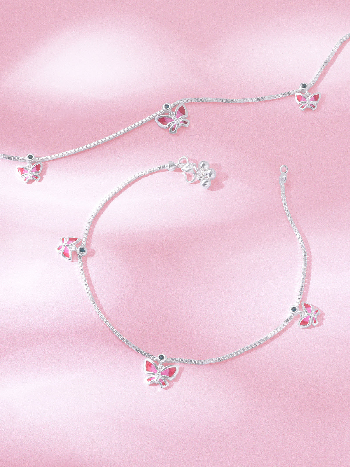 Detailed close up of SIJA 925 Silver Pink Butterfly Parade Anklet highlighting pink butterfly charm craftsmanship