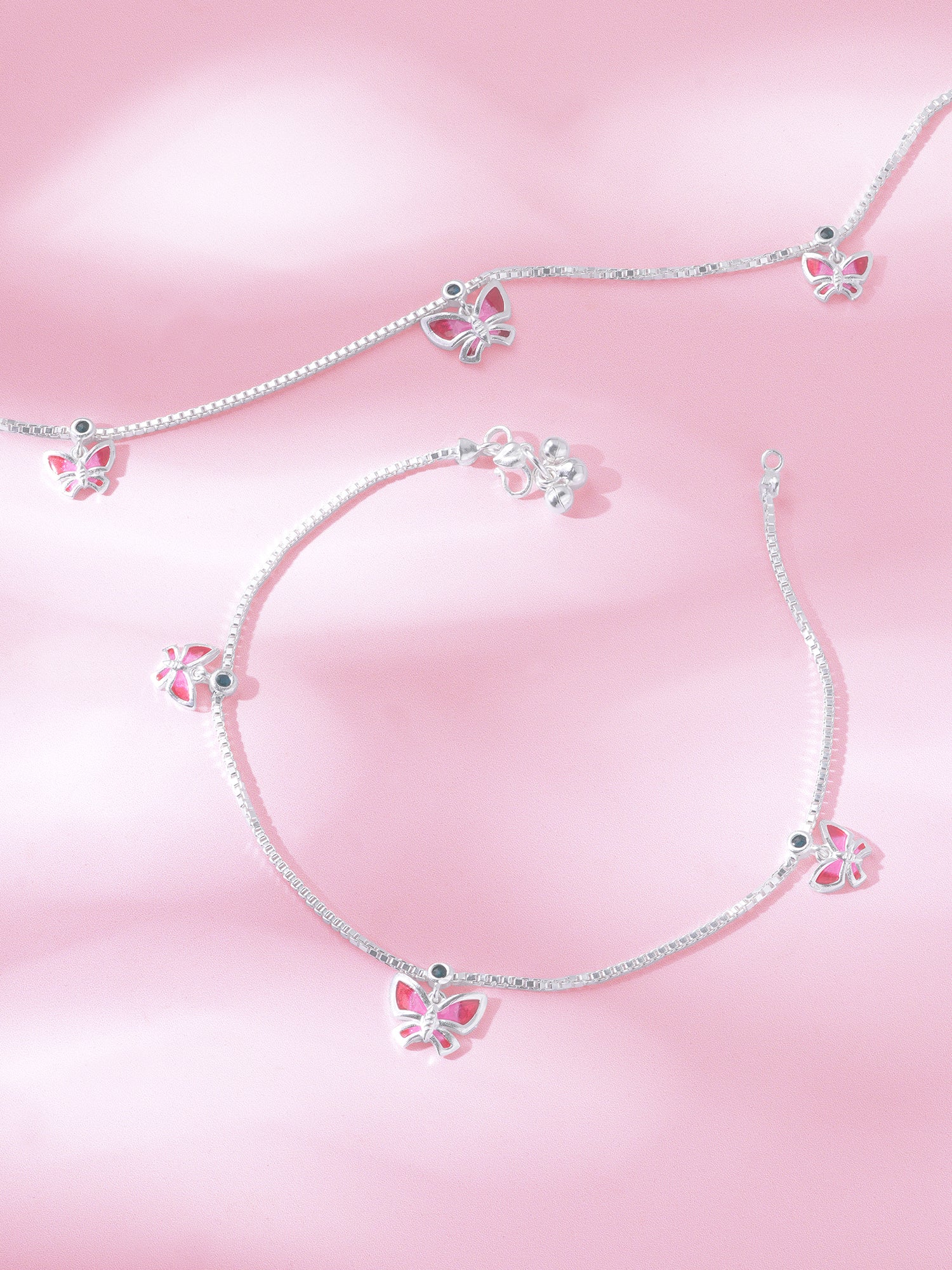 Detailed close up of SIJA 925 Silver Pink Butterfly Parade Anklet highlighting pink butterfly charm craftsmanship
