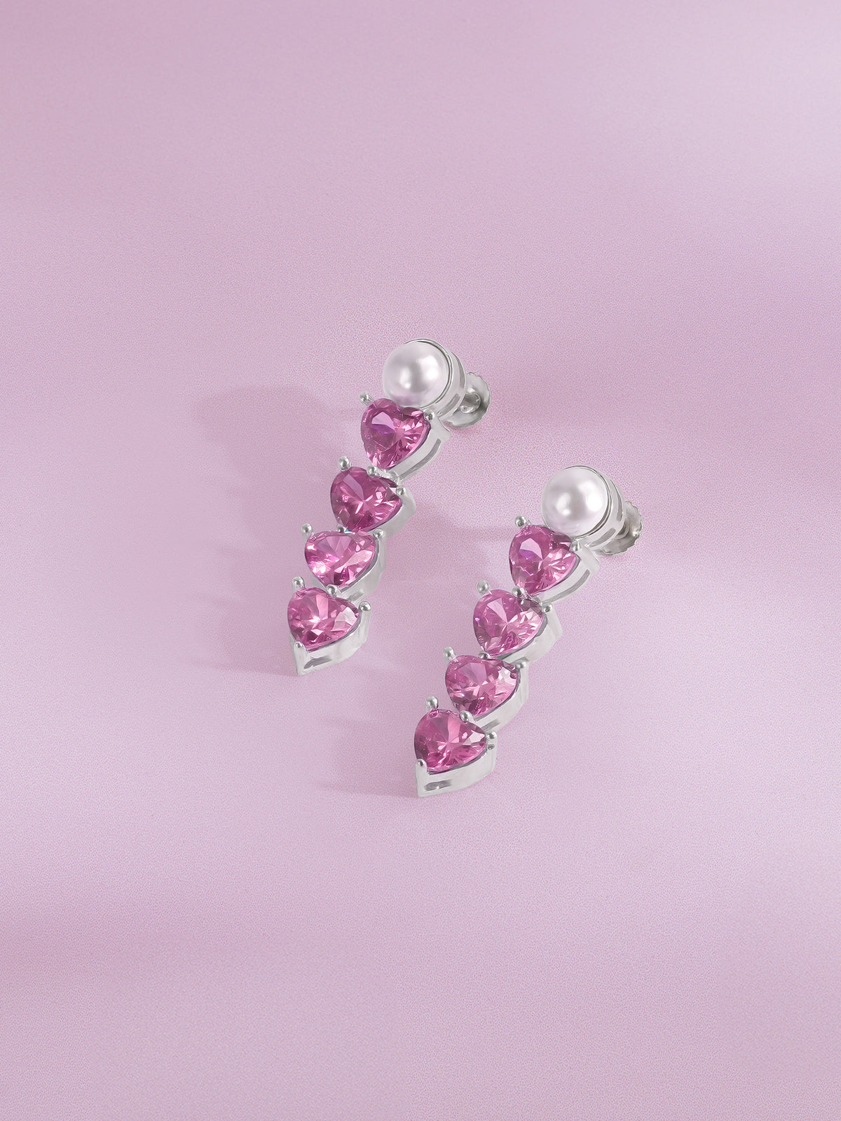 Detailed close up of SIJA 925 Silver Heart Stone Drop Earrings showing sparkling heart shaped stone and handcrafted silver finish