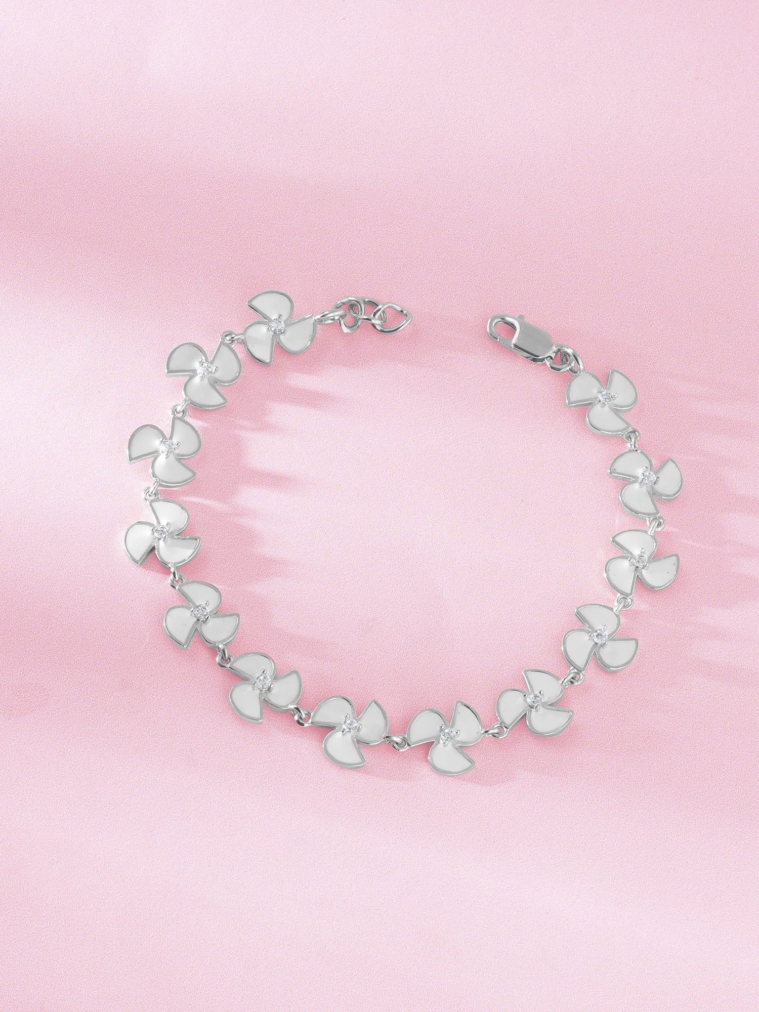Detailed close up of SIJA 925 Silver Pinwheel Chain Bracelet highlighting pinwheel charm craftsmanship