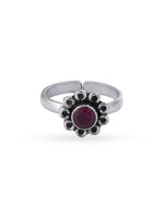 Detailed close up of SIJA 925 Silver Ruby Timeless Blossom Antique Toe Ring showing oxidised floral motif with ruby stone center piece