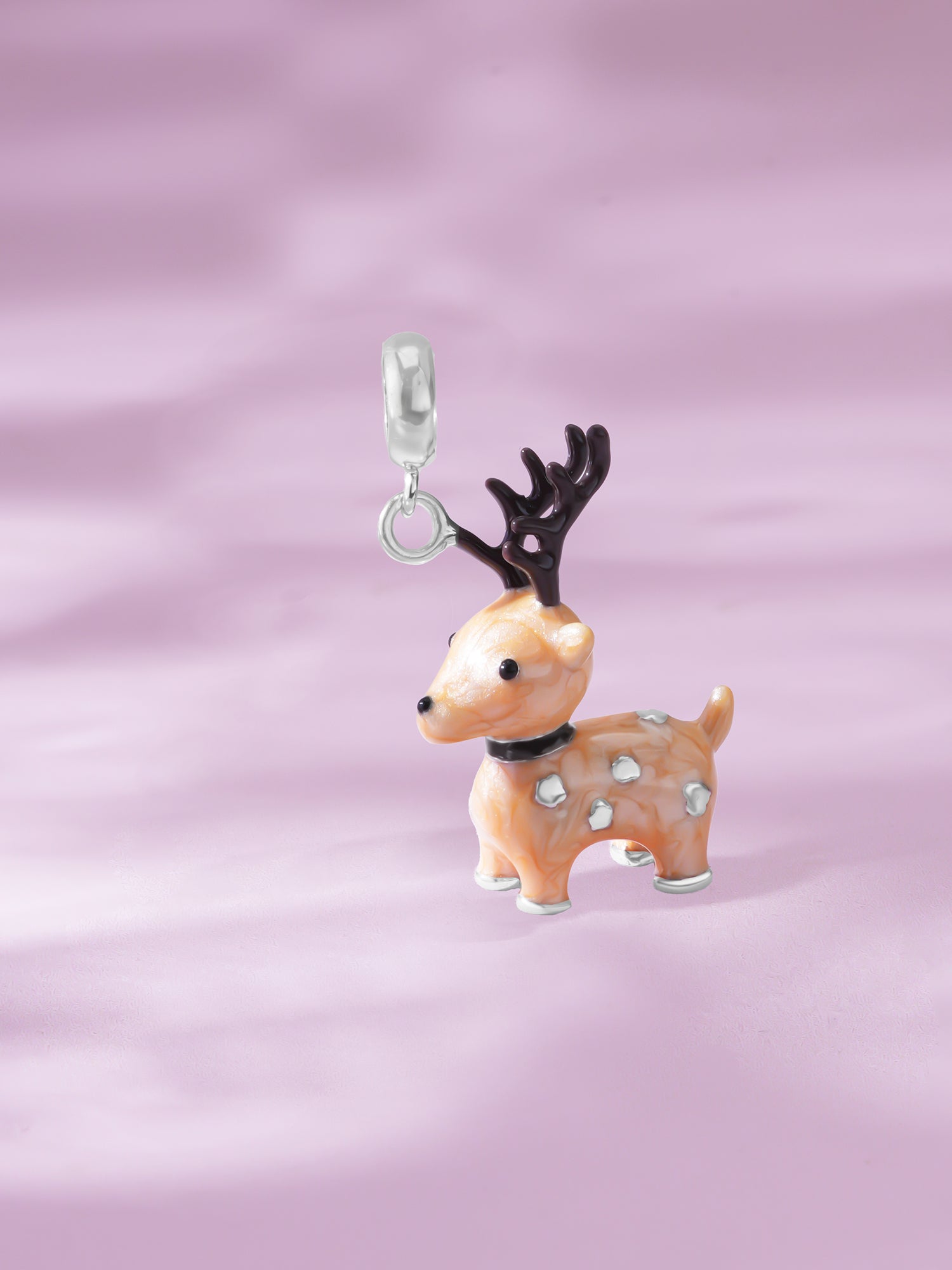 Detailed close up of SIJA Deer Charm Ring showing delicate deer charm design and premium sterling silver craftsmanship