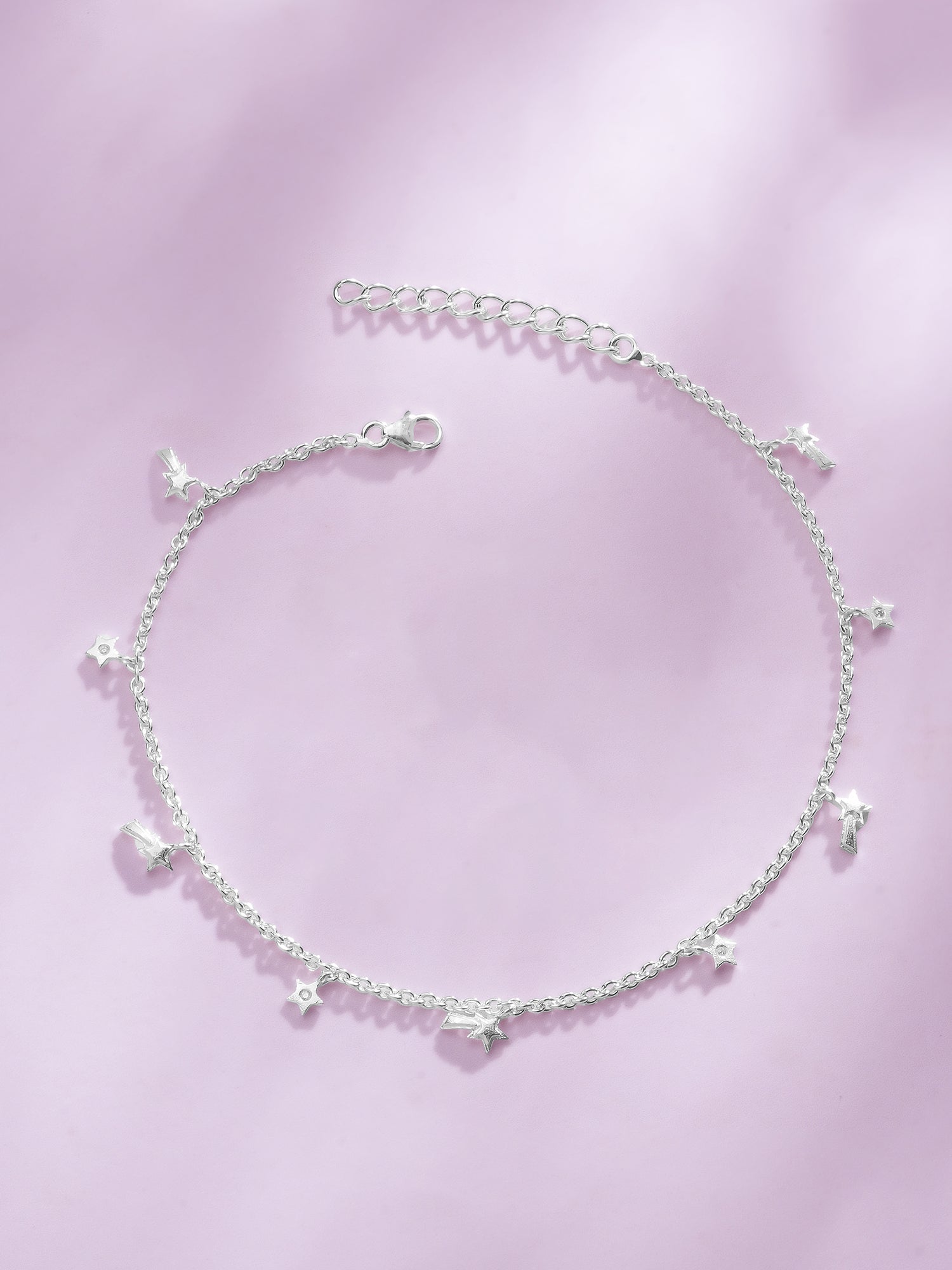 Detailed close up of SIJA 925 Silver Shooting Star Anklet showing sparkling shooting star charms with handcrafted silver finish