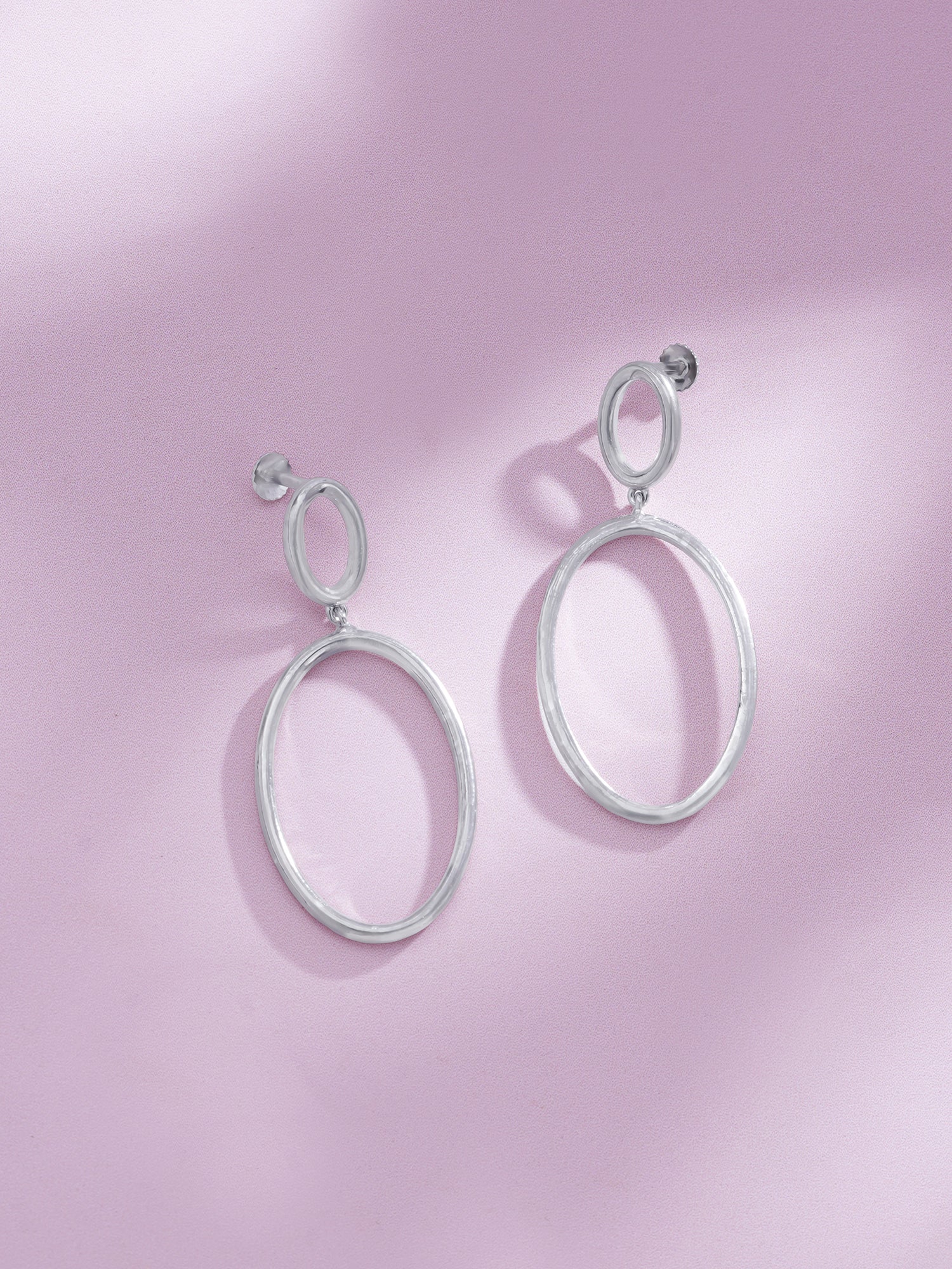 Detailed close up of SIJA 925 Silver O Ring Earrings showing minimalist round hoop design in sterling silver