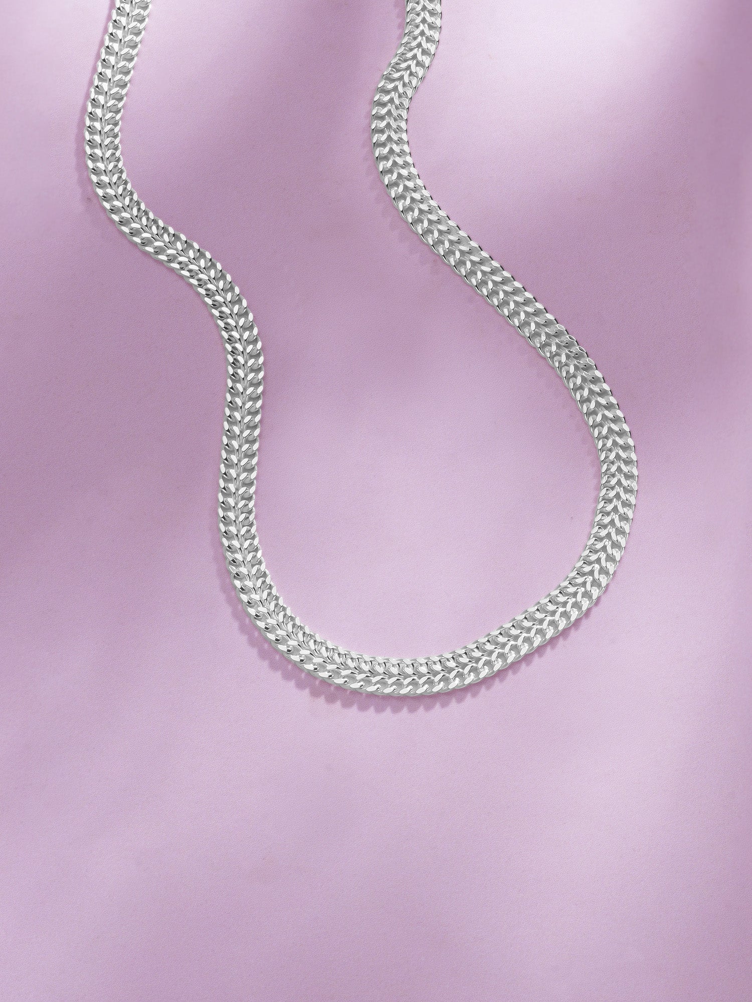 Detailed close up of SIJA 925 Silver Stream Chain showing smooth flowing links and handcrafted silver finish