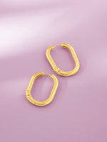 Detailed close up of SIJA 925 Silver Sleek Oval Hoop Earrings showing sleek oval hoop design and handcrafted silver finish