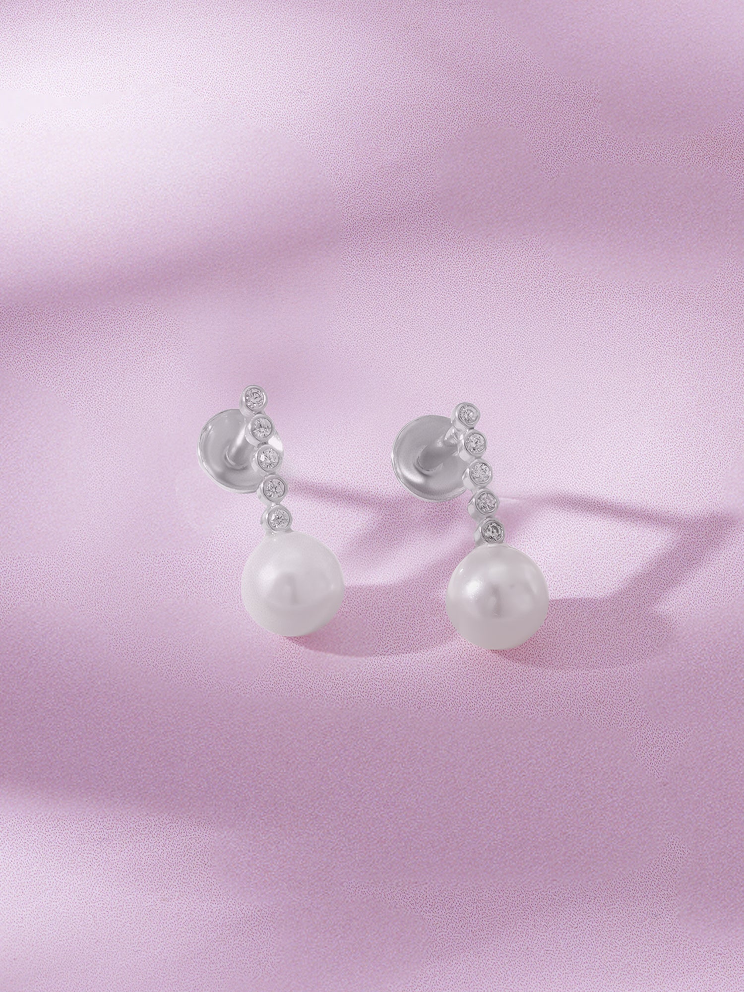 Detailed close up of SIJA 925 Silver Sleek Pearl Stud showing smooth round pearl and handcrafted silver finish