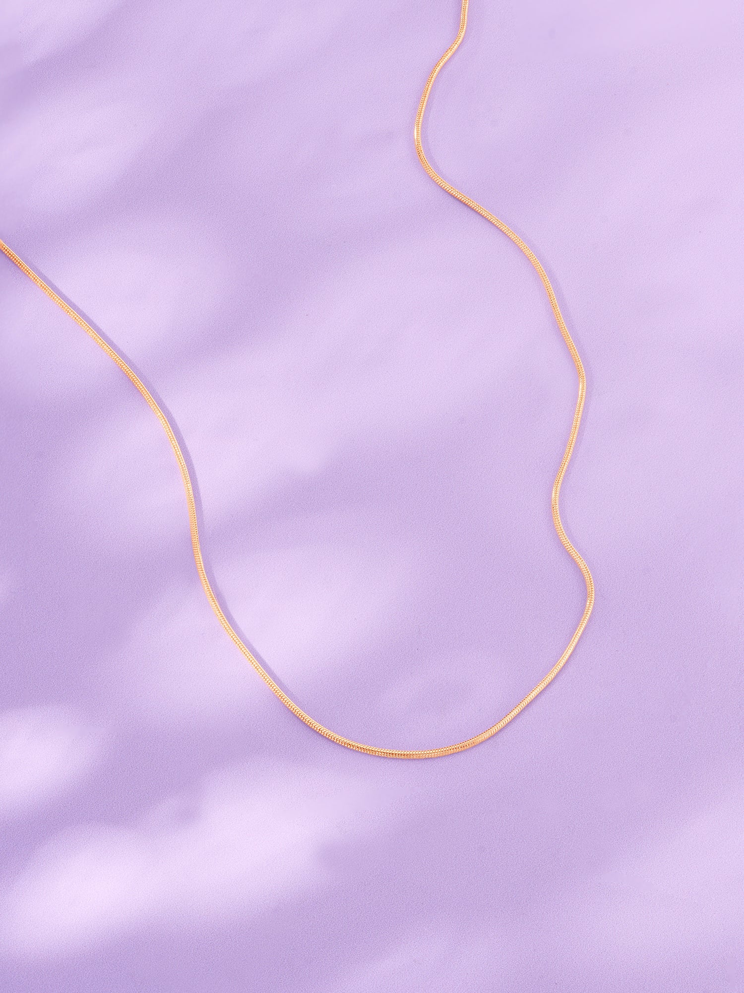 Detailed close up of SIJA 925 Silver Rose Gold Sleek Snake Chain showing smooth flexible links and rose gold plated finish