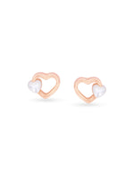 Detailed close up of SIJA 925 Silver Tiny Pearl Heart Stud showing luminous pearl set in delicate heart motif