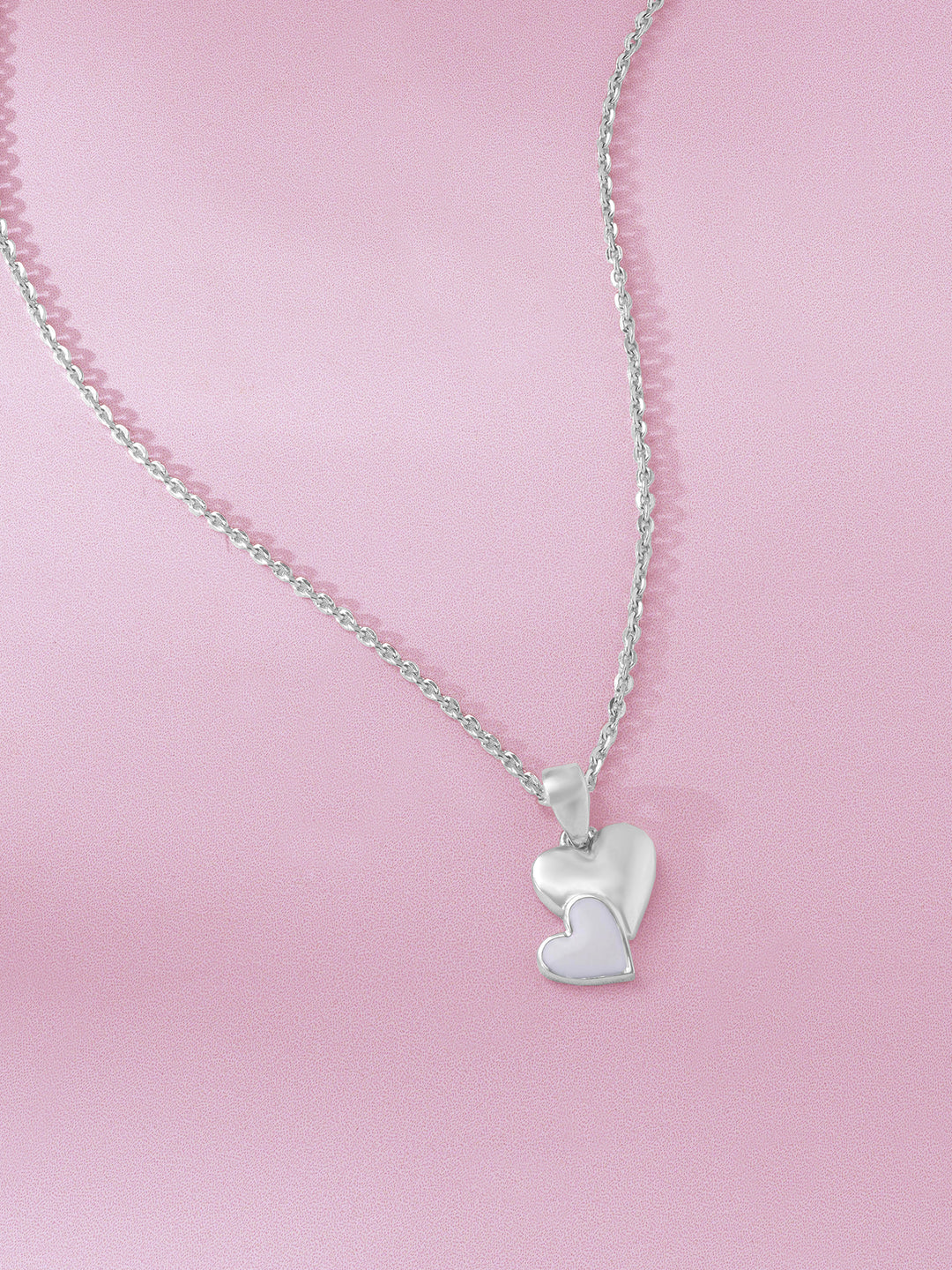 Detailed close up of SIJA 925 Silver Twin Hearts Whisper Pendant with Chain highlighting twin heart charm craftsmanship