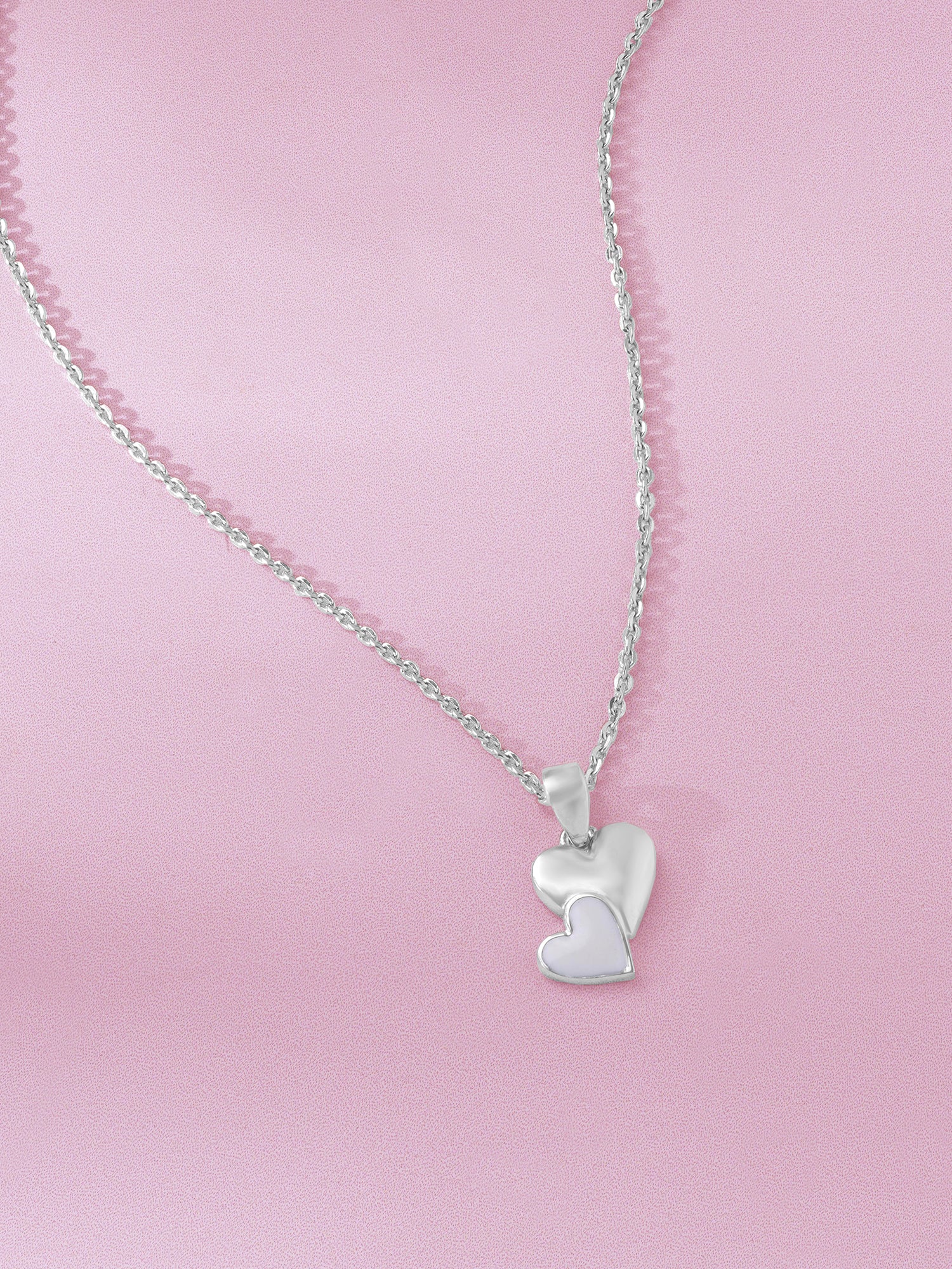 Detailed close up of SIJA 925 Silver Twin Hearts Whisper Pendant with Chain highlighting twin heart charm craftsmanship