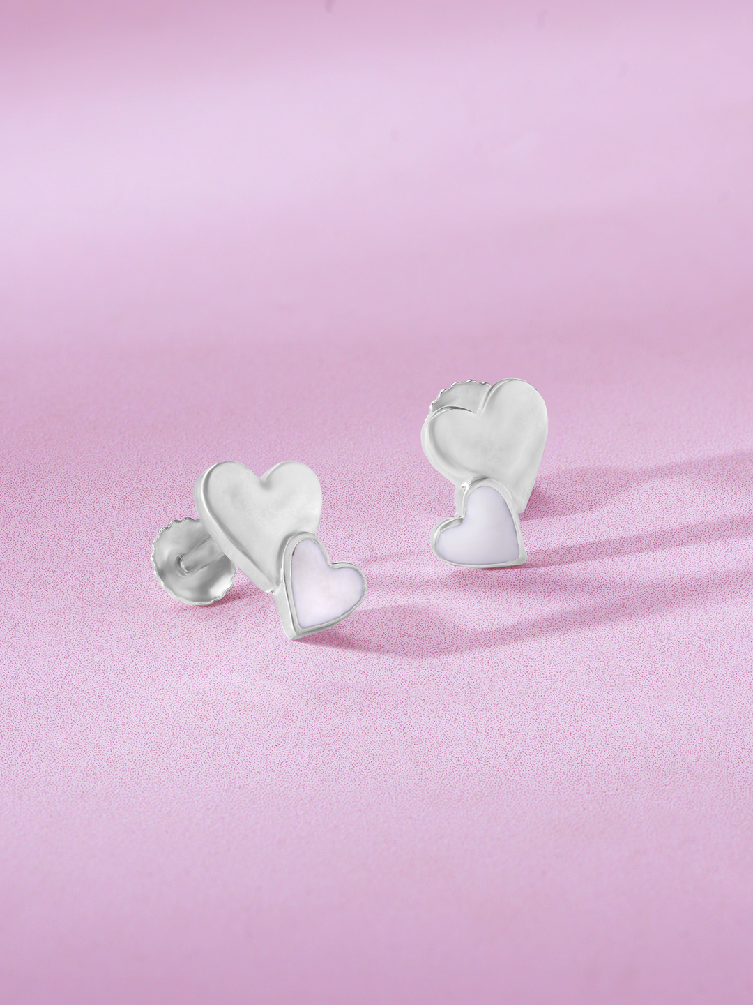 Close up of SIJA 925 Silver Twin Hearts Whisper Stud highlighting twin heart design and sparkling finish