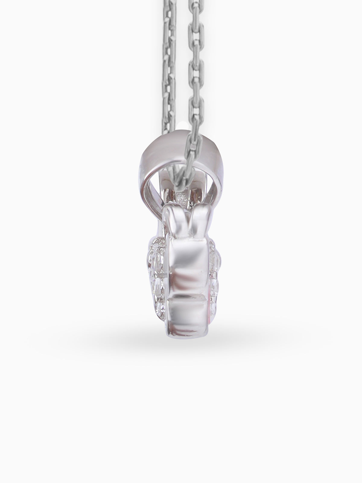 Side view SIJA 925 silver jewellery white pink little butterfly pendant stylish handcrafted accessory perfect for weddings parties anniversaries and festive wear