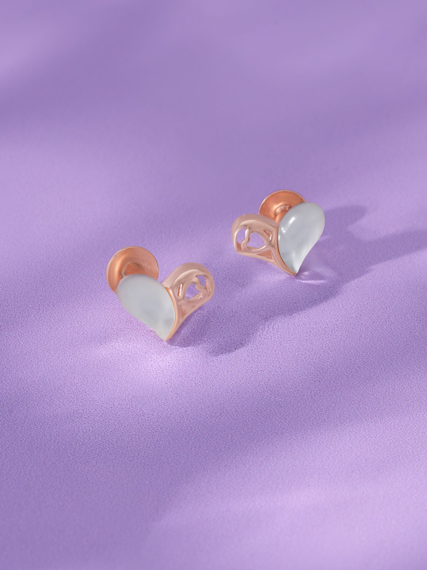 Detailed close up of SIJA 925 Silver Whispering Heart Stud showing delicate heart design and handcrafted silver finish